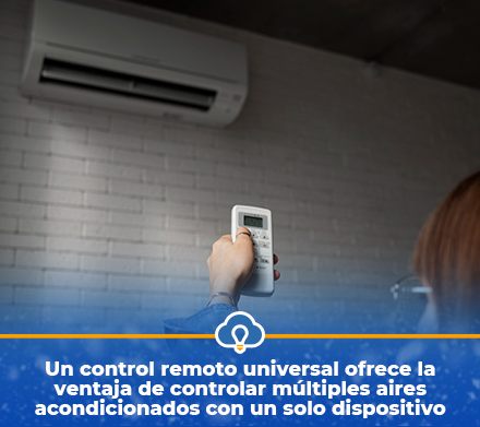 Mujer con control remoto universal ancendiendo aire acondicionado